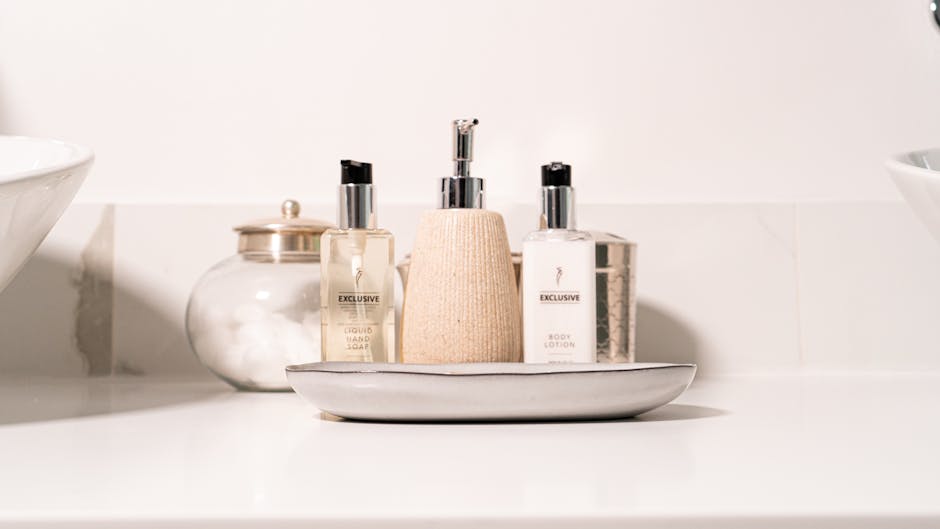 Minimalist bathroom setup with hand soap and lotion in a modern setting.